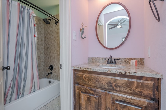 bathroom featuring tile floors, ceiling fan, shower / bath combo, and vanity