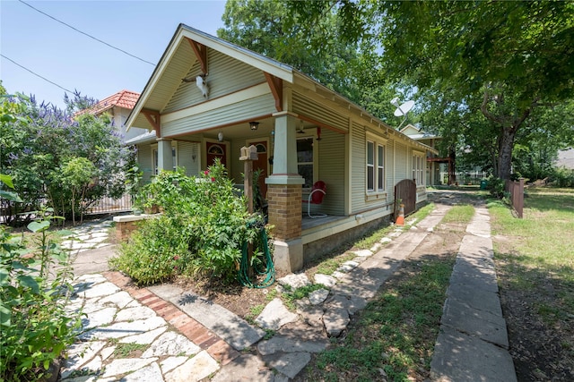 view of home's exterior featuring covered porch