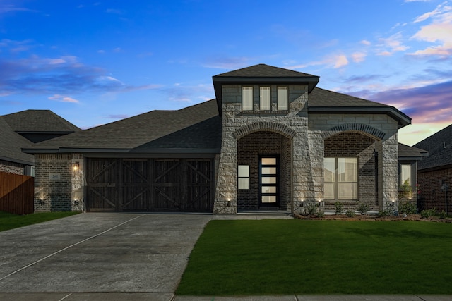 view of front of house with a lawn