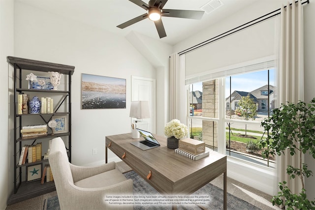 office featuring a wealth of natural light, lofted ceiling, ceiling fan, and carpet flooring