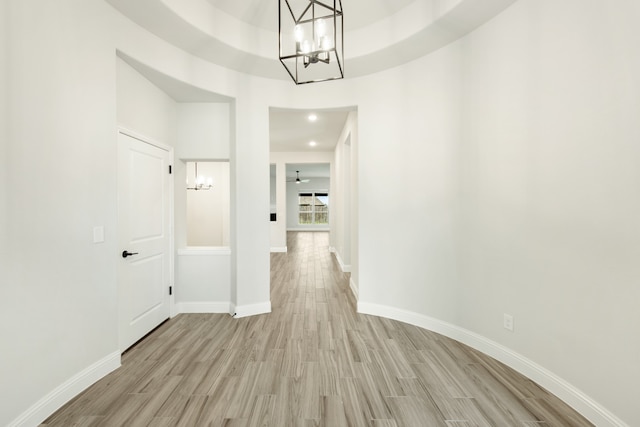 corridor with light wood-type flooring