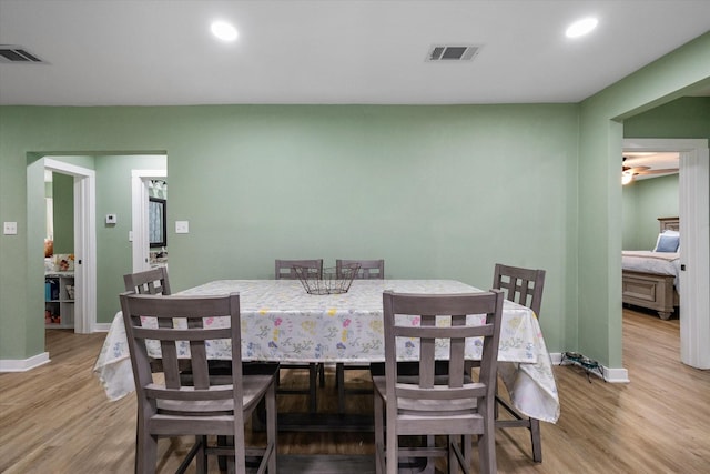 dining room with light hardwood / wood-style flooring