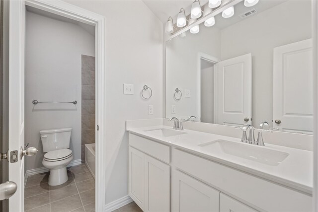 full bathroom with toilet, bathing tub / shower combination, vanity, and tile patterned flooring