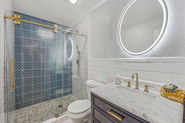 bathroom featuring tile walls, an enclosed shower, backsplash, and toilet