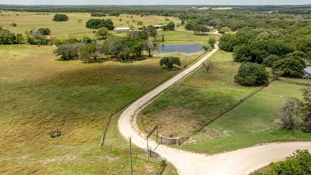 aerial view featuring a rural view and a water view