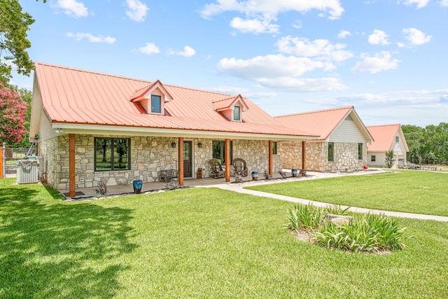 view of front facade with a front lawn