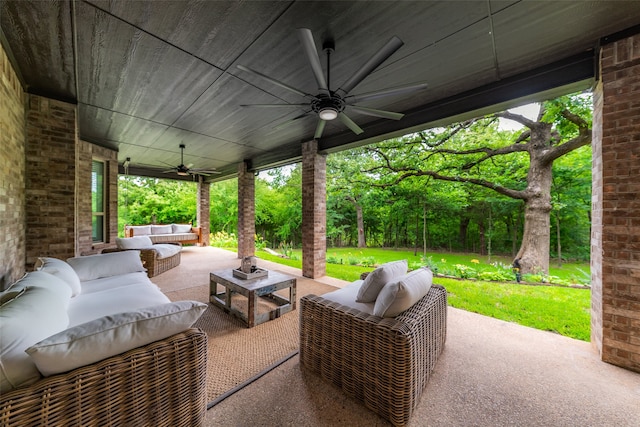 view of patio with outdoor lounge area and ceiling fan