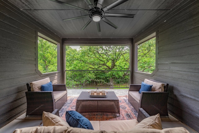 view of patio featuring an outdoor living space and ceiling fan