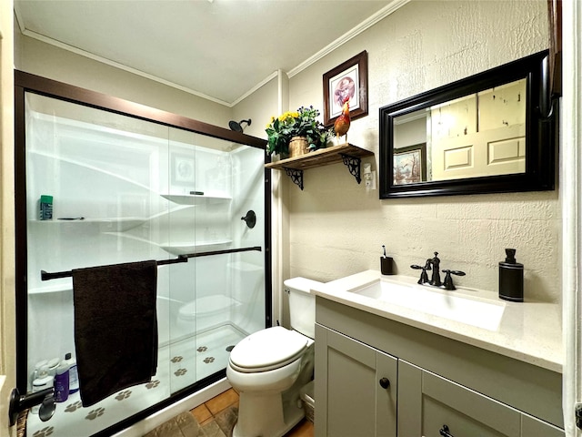 bathroom featuring an enclosed shower, toilet, crown molding, and large vanity