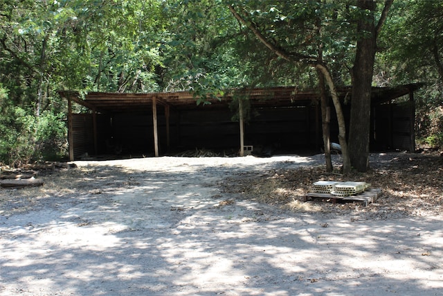 exterior space with a carport