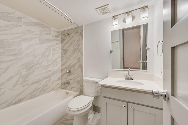 full bath featuring visible vents, toilet, marble finish floor, bathtub / shower combination, and vanity