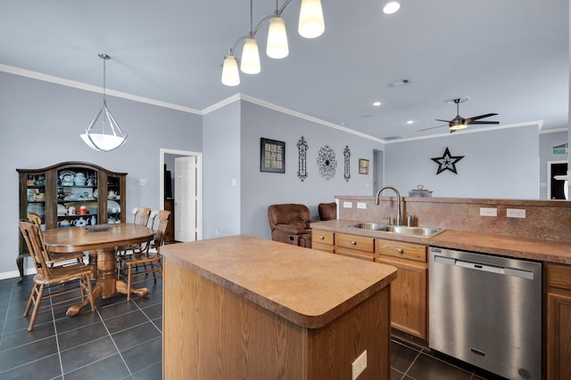 kitchen with dishwasher, a kitchen island, sink, hanging light fixtures, and ceiling fan