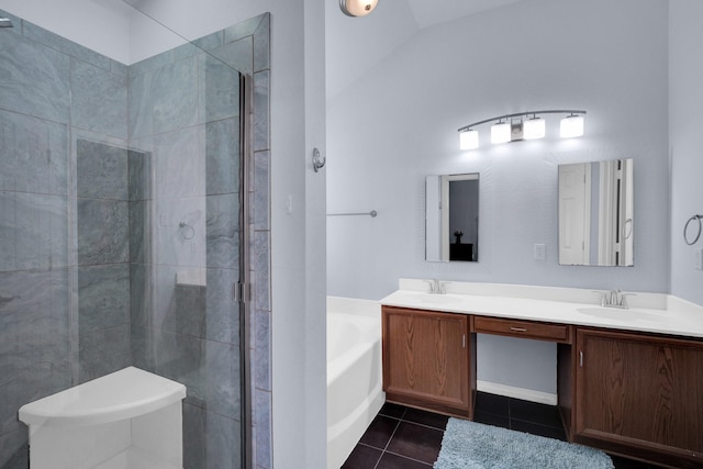 bathroom featuring tile patterned floors, vanity, and plus walk in shower