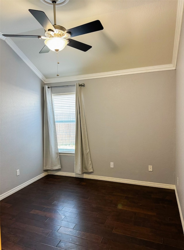 unfurnished room featuring lofted ceiling, ceiling fan, dark hardwood / wood-style floors, and crown molding