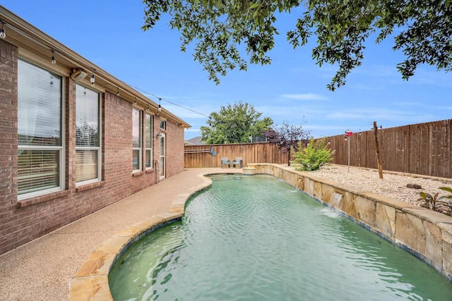 view of pool featuring pool water feature