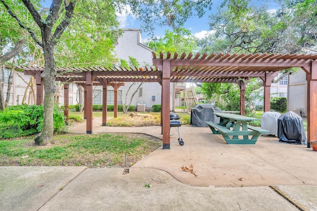 view of patio / terrace with a pergola and grilling area