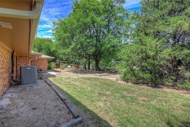 view of yard with central AC