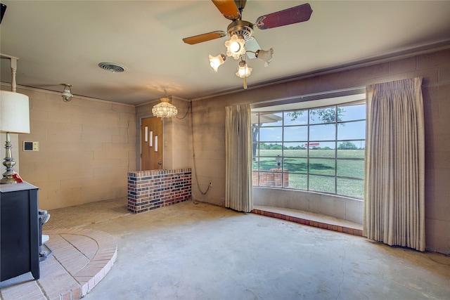 unfurnished room with ceiling fan