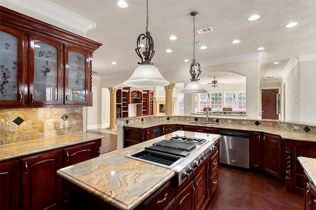 kitchen with crown molding, stainless steel appliances, decorative light fixtures, dark hardwood / wood-style flooring, and a center island