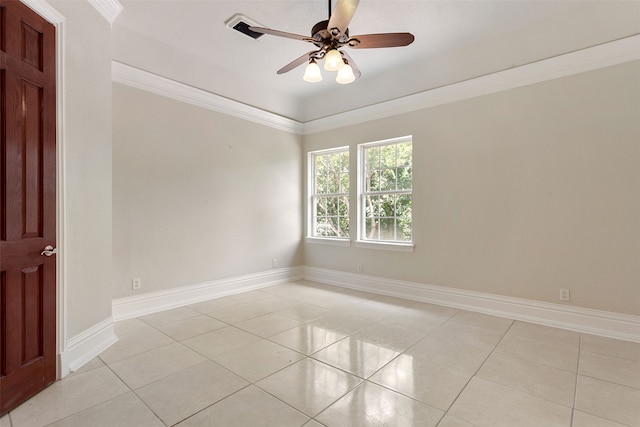 unfurnished room with ceiling fan, ornamental molding, and light tile floors