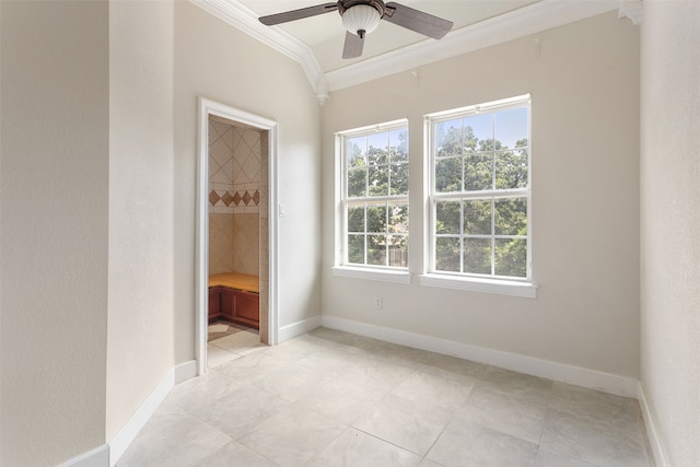 unfurnished bedroom featuring light tile flooring, ceiling fan, ornamental molding, connected bathroom, and a spacious closet