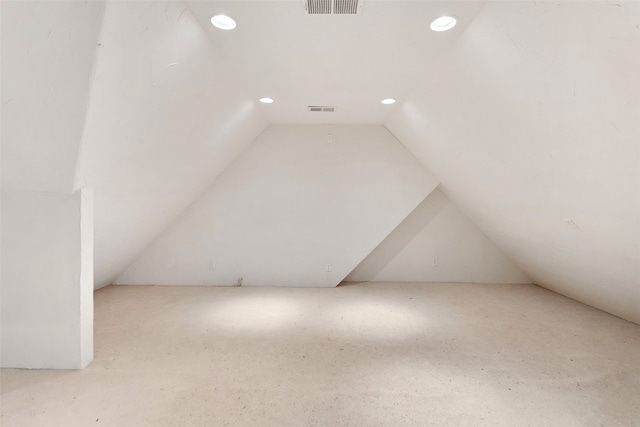 bonus room featuring vaulted ceiling