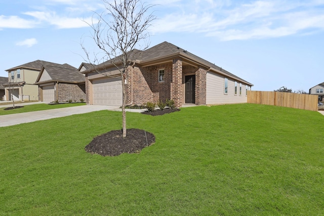 view of front facade with a garage and a front yard