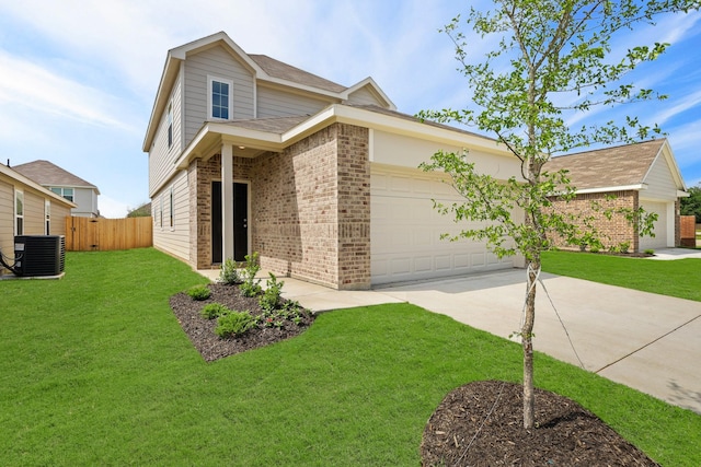 view of front facade with central AC, a garage, and a front lawn