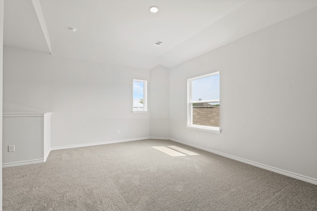 unfurnished room featuring carpet flooring