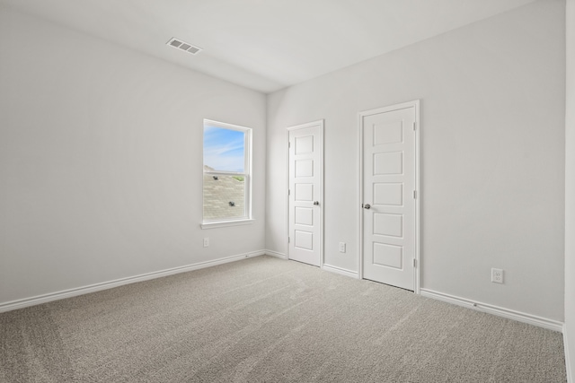 unfurnished bedroom featuring carpet floors