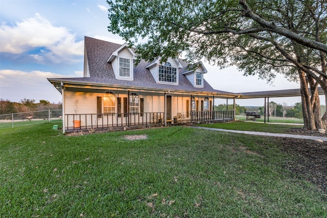 view of front of home featuring a porch and a front yard