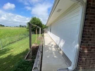 view of home's exterior featuring a yard