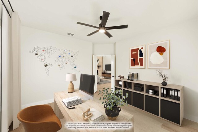 office featuring wood-type flooring and ceiling fan