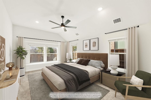 bedroom with ceiling fan, light colored carpet, and lofted ceiling