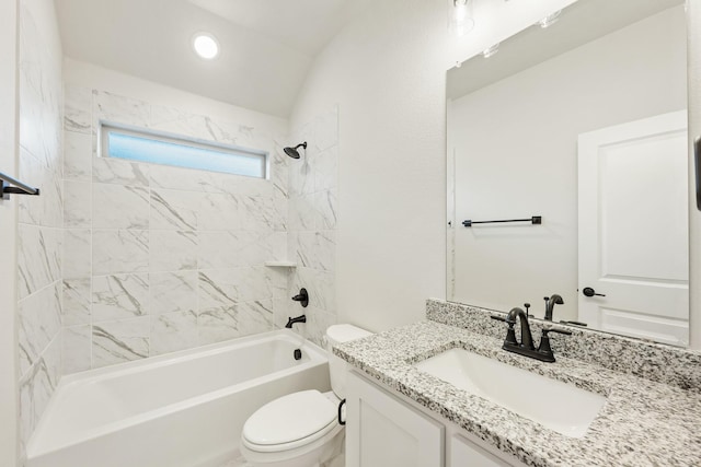 full bathroom featuring vanity, toilet, and tiled shower / bath combo