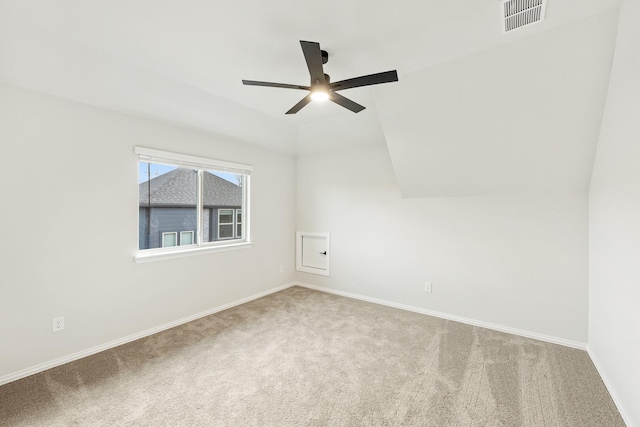 empty room featuring ceiling fan and carpet floors