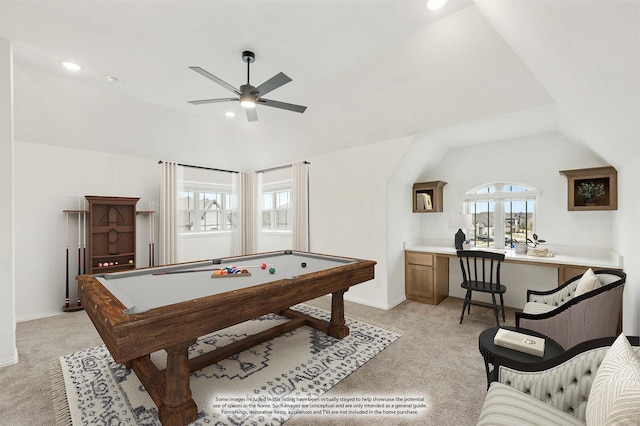 rec room featuring vaulted ceiling, light carpet, and ceiling fan