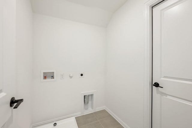 laundry area featuring hookup for a gas dryer, electric dryer hookup, washer hookup, and light tile patterned floors