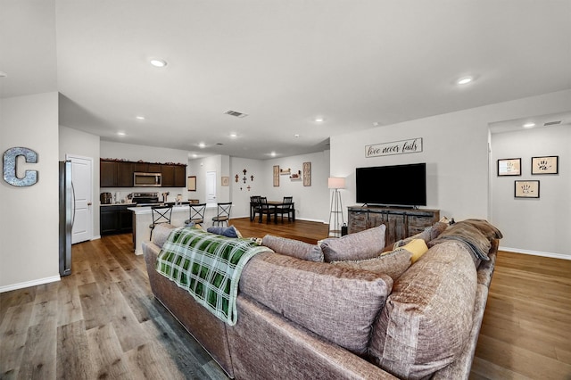 living room featuring light wood-type flooring