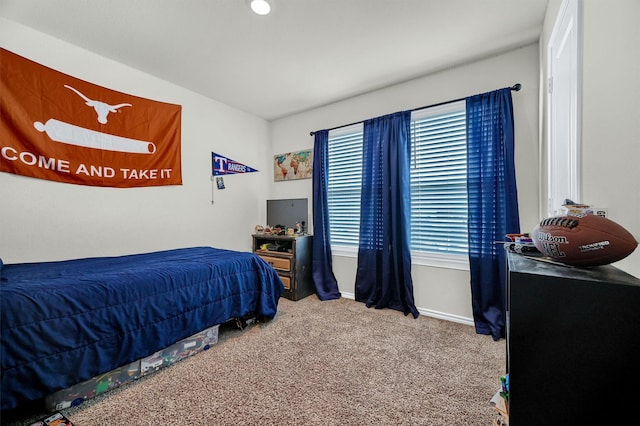 bedroom featuring carpet flooring