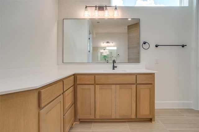 bathroom featuring vanity and tile patterned flooring