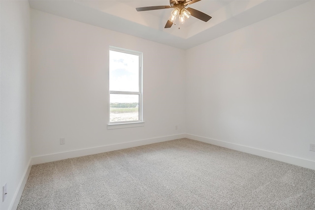 unfurnished room with carpet and ceiling fan