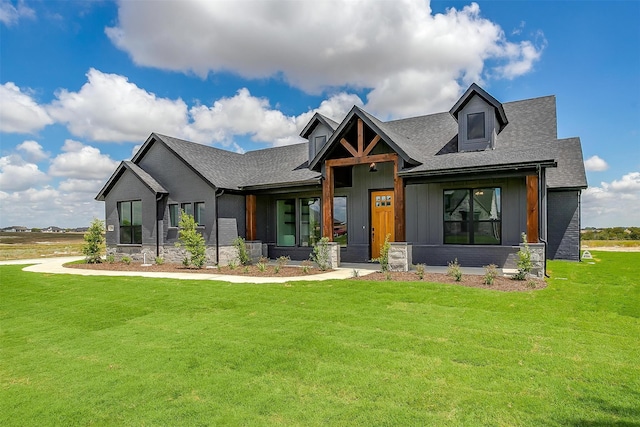 view of front of property with a front lawn