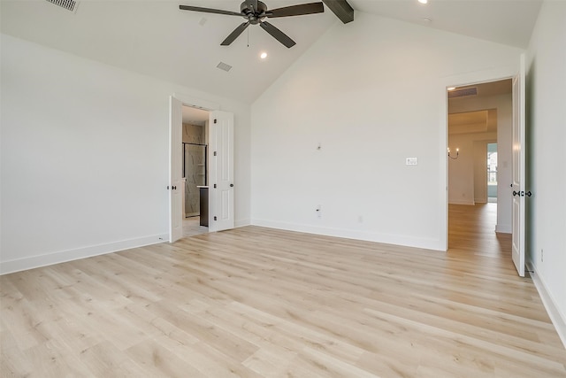 spare room with beamed ceiling, high vaulted ceiling, ceiling fan, and light hardwood / wood-style floors