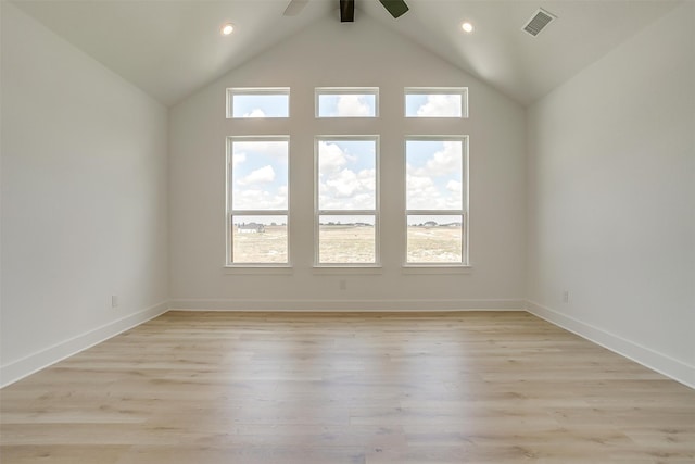 unfurnished room featuring light wood-type flooring, beamed ceiling, high vaulted ceiling, and ceiling fan