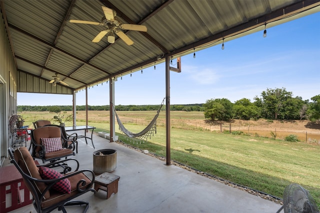 view of patio featuring ceiling fan