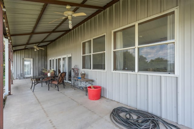 view of patio featuring ceiling fan