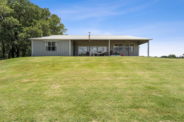 view of outdoor structure featuring a yard