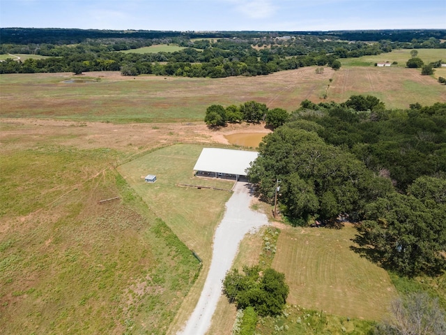 birds eye view of property featuring a rural view