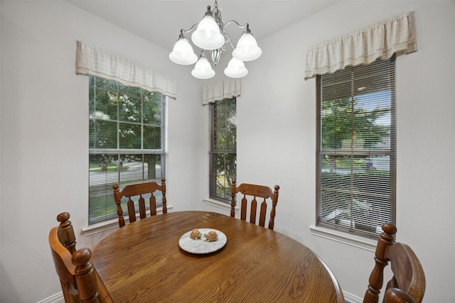 dining area featuring a chandelier